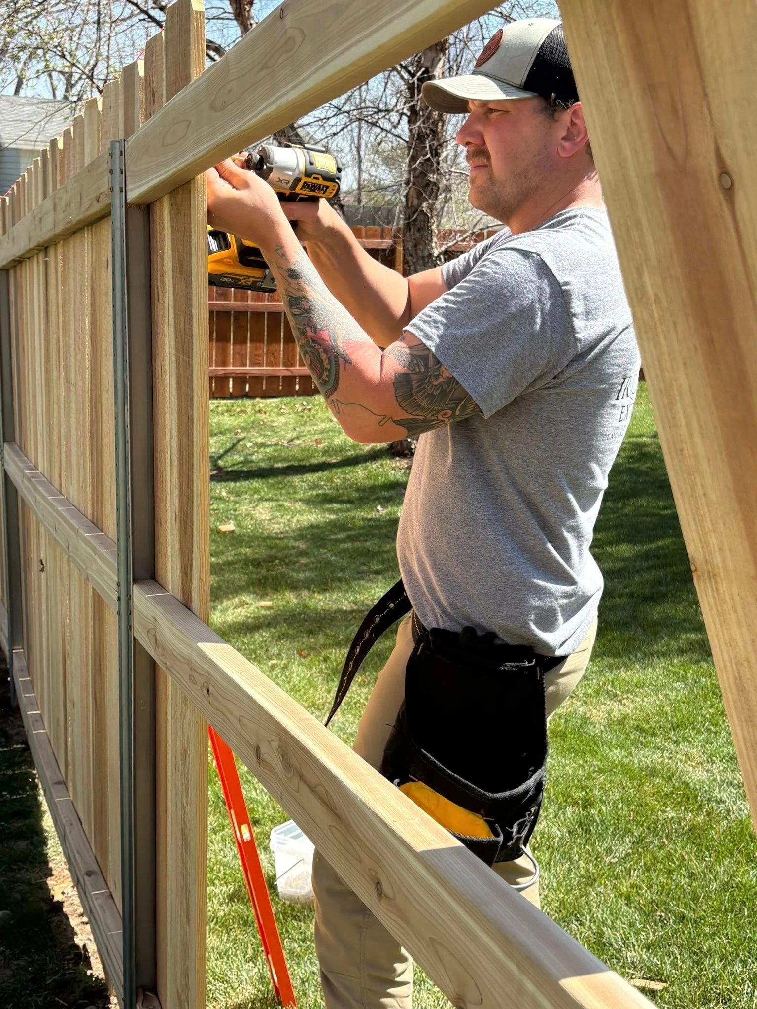 Professional exterior construction crew with tools and equipment ready for residential projects.